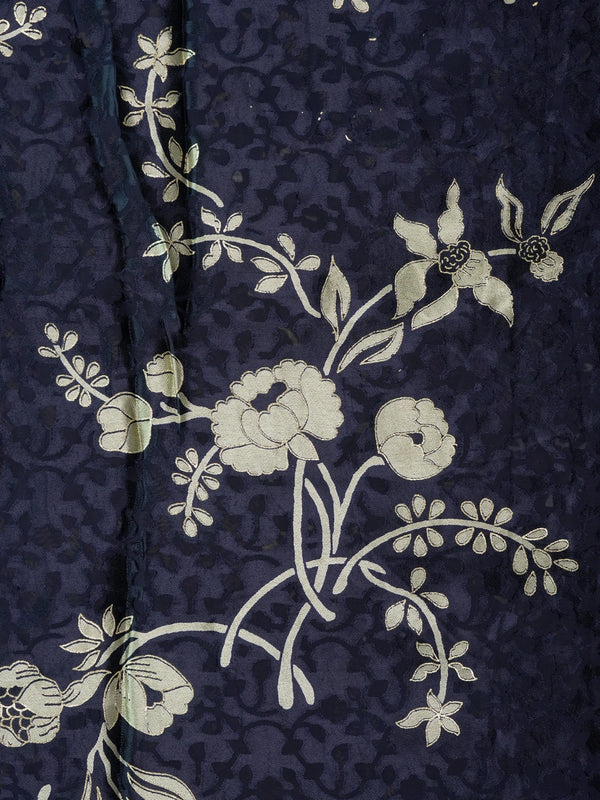 Navy blue designer saree with gold floral print, lotus pallu motifs and patola geometric border