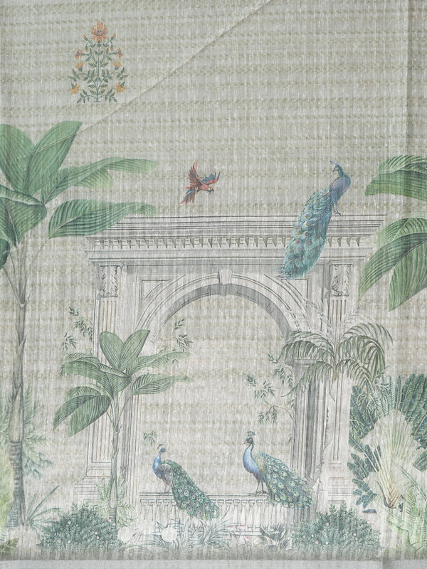 Grey and green semi tussar saree with floral buttas, silver-grey zari border and peacock scenic pallu