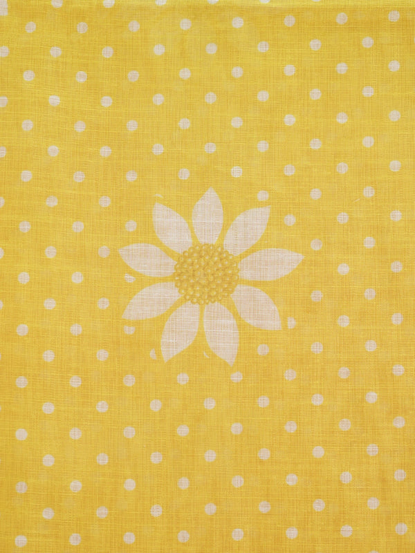 Yellow and white polka dot linen cotton saree with daisy floral prints and slim golden border