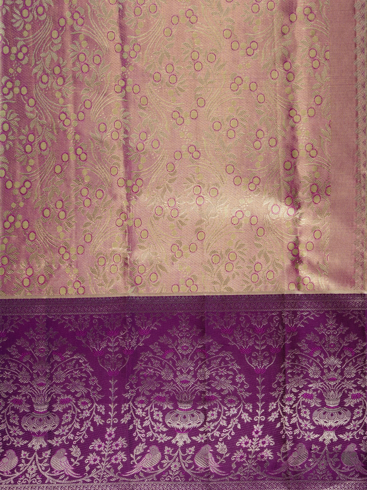Rose gold and purple pure Kanchipuram silk saree with gold zari floral jaal body and contrast purple peacock border