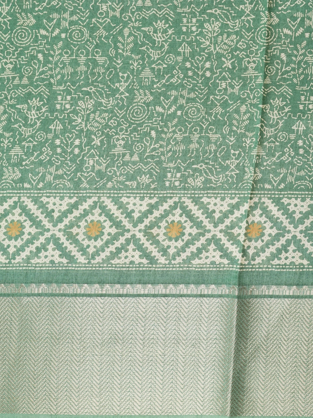 Sea green designer saree with cream tribal Warli print and gold zari border