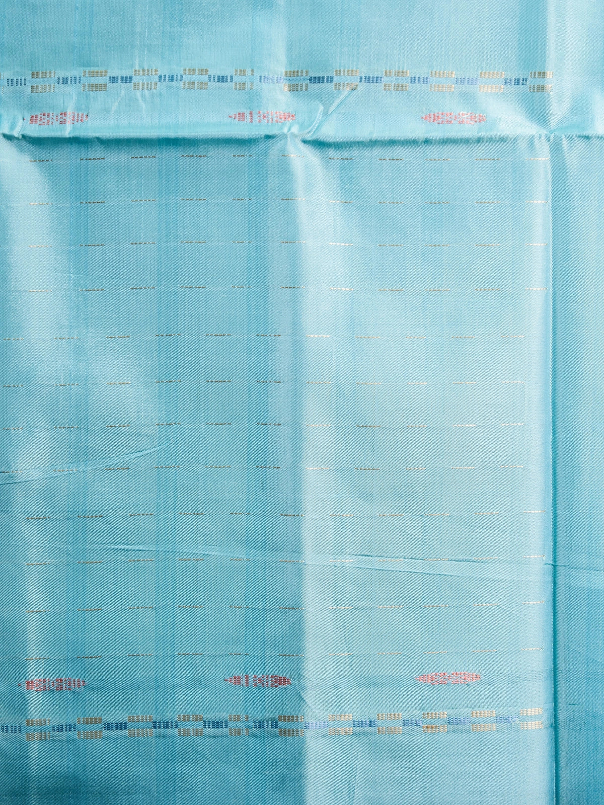 Navy blue banana silk saree with sky-blue contrast pallu, zari stripes and striped border