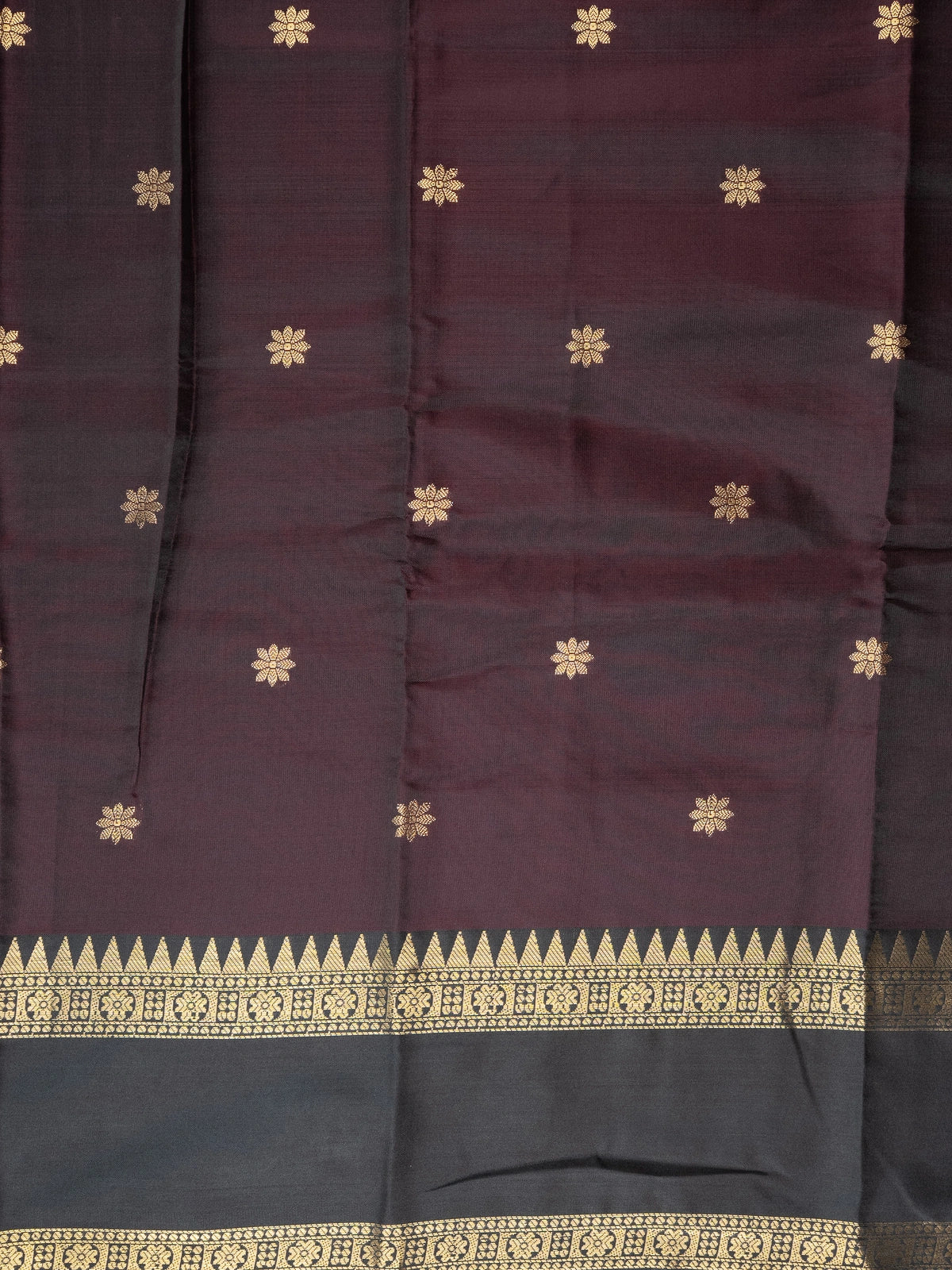 Wine brown Kanchi semi silk saree with contrast green and gold zari border and floral buttas