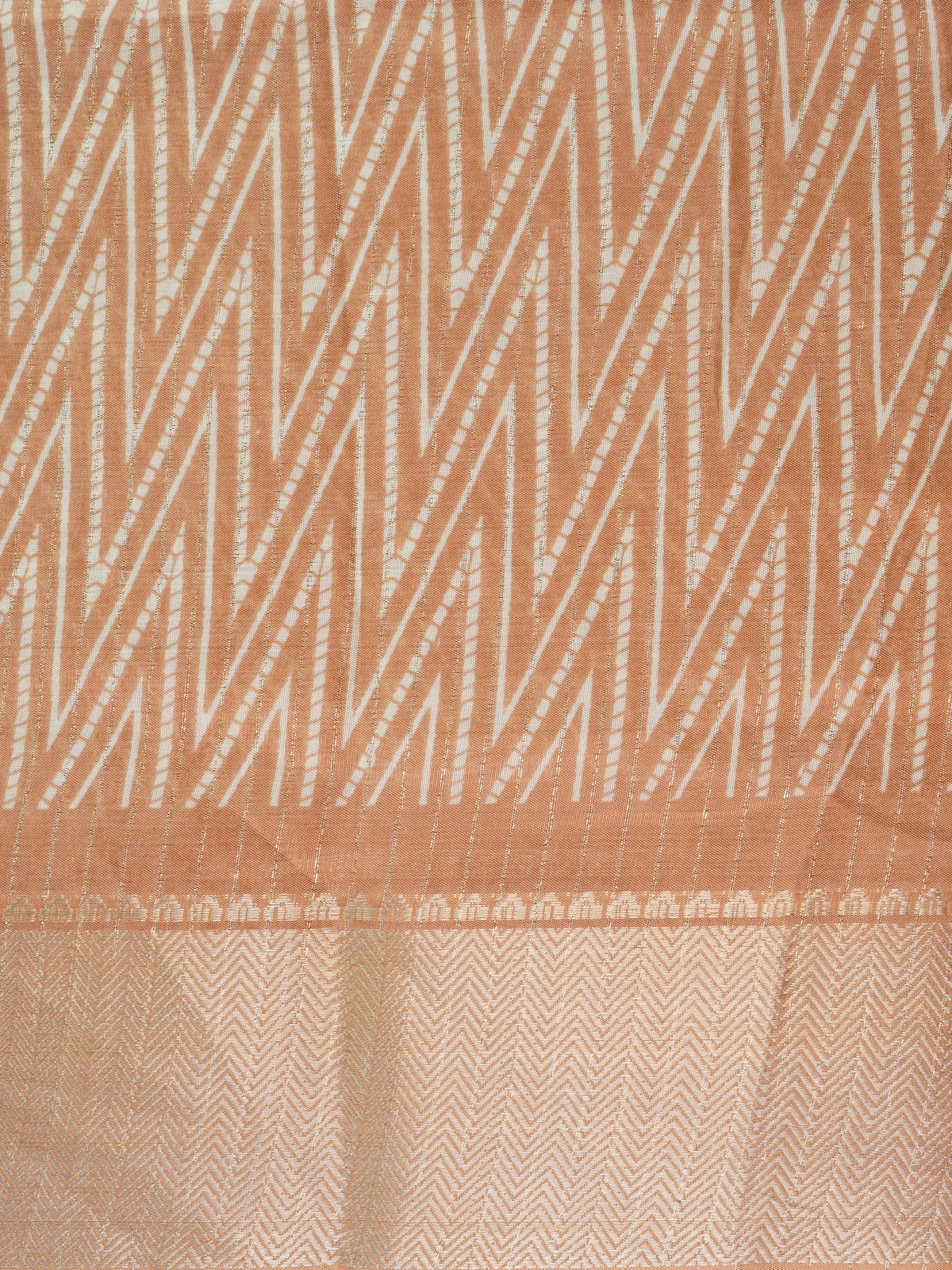 Peach and white designer saree with chevron print, gold zari border and tree-of-life pallu