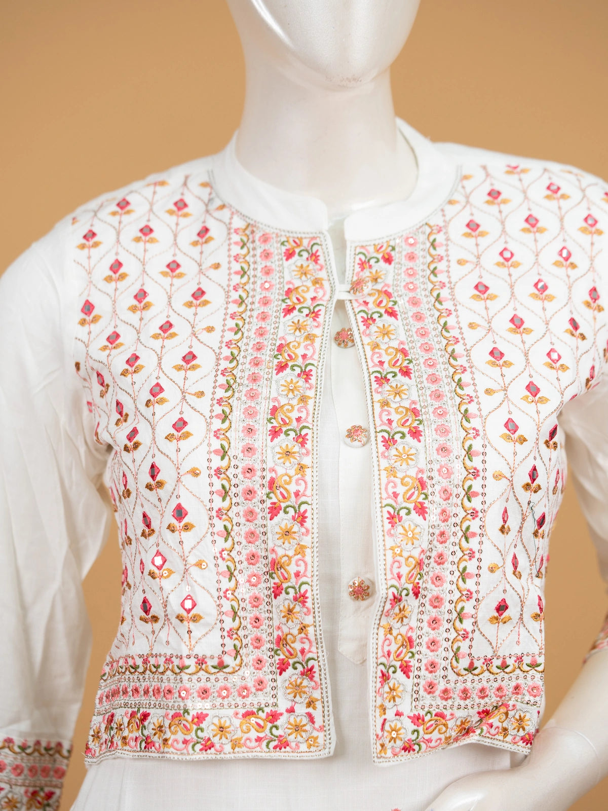 White cotton straight cut kurti set with multicolour embroidered cropped jacket and matching pants