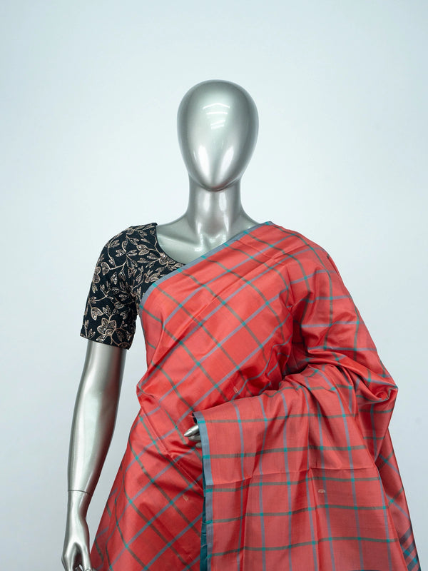 Coral red checked Banana Silk saree with contrast teal striped pallu and border