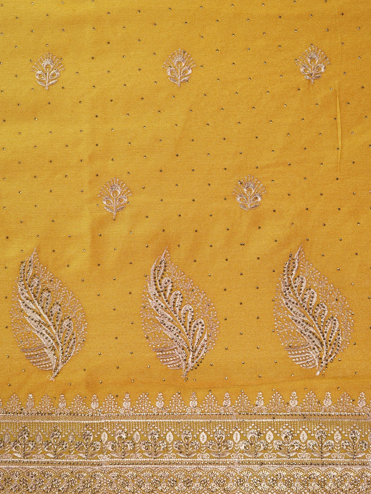 Mustard yellow designer saree with rose-gold embroidered butas, paisley pallu and embellished border