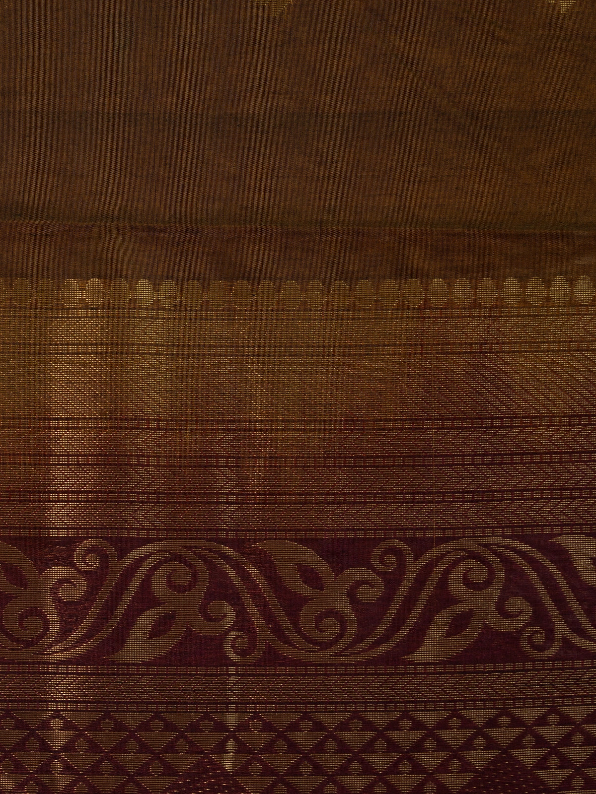 Mehendi-green silk cotton saree with maroon contrast border and gold zari peacock pallu