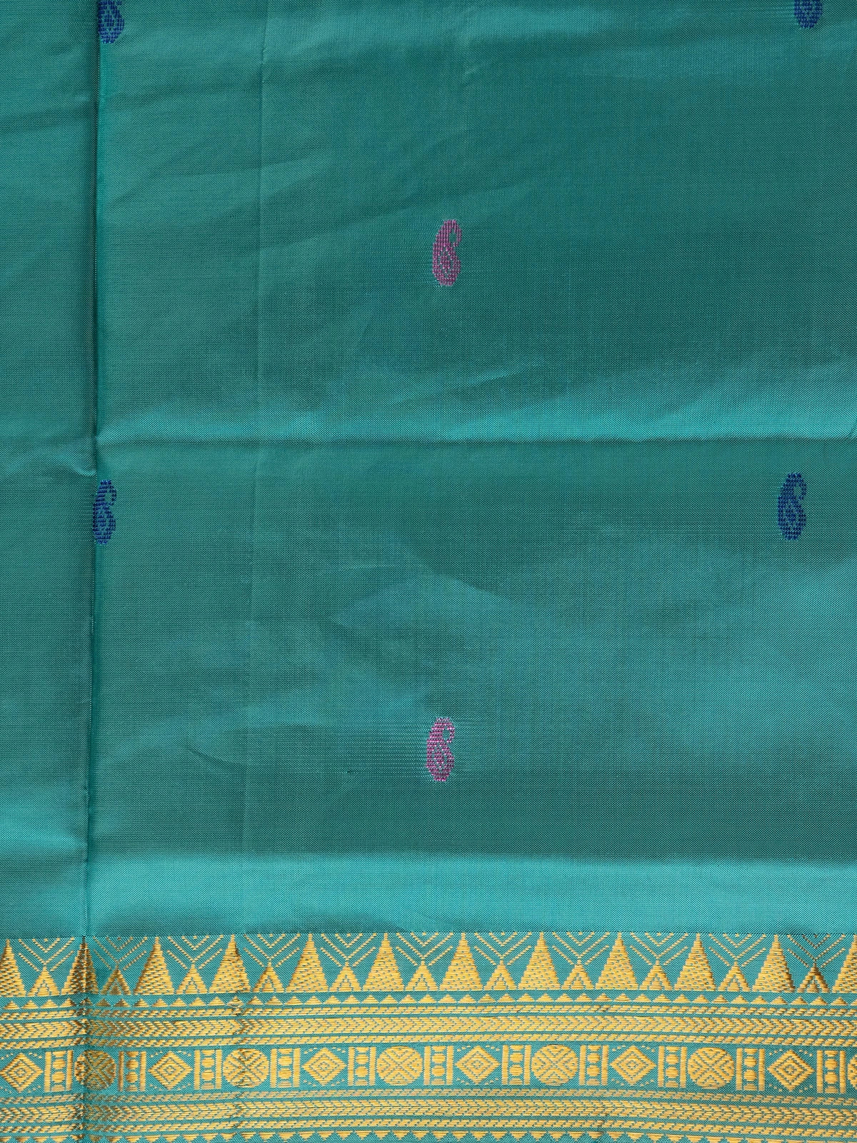 Teal green Banana Silk saree with gold zari border, paisley buttas and contrast cream pallu