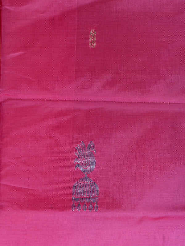 Pink banana silk saree with contrast green pallu and woven peacock motifs