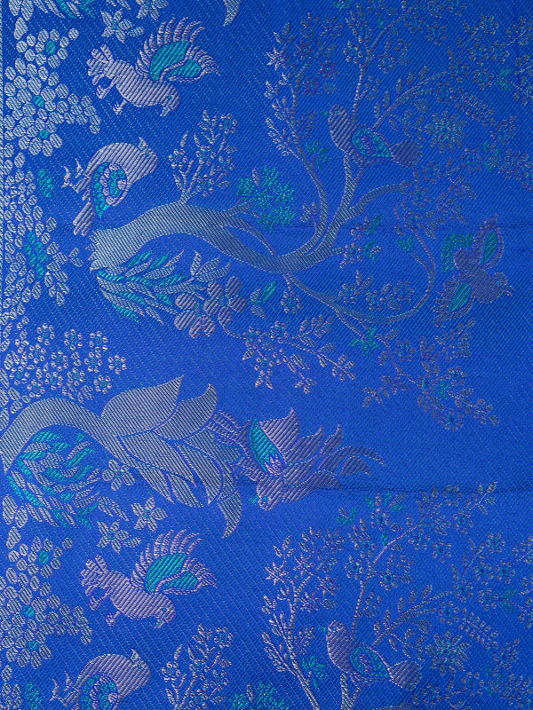 Green pure Kanchipuram silk saree with gold zari brocade and contrast royal blue peacock-motif border