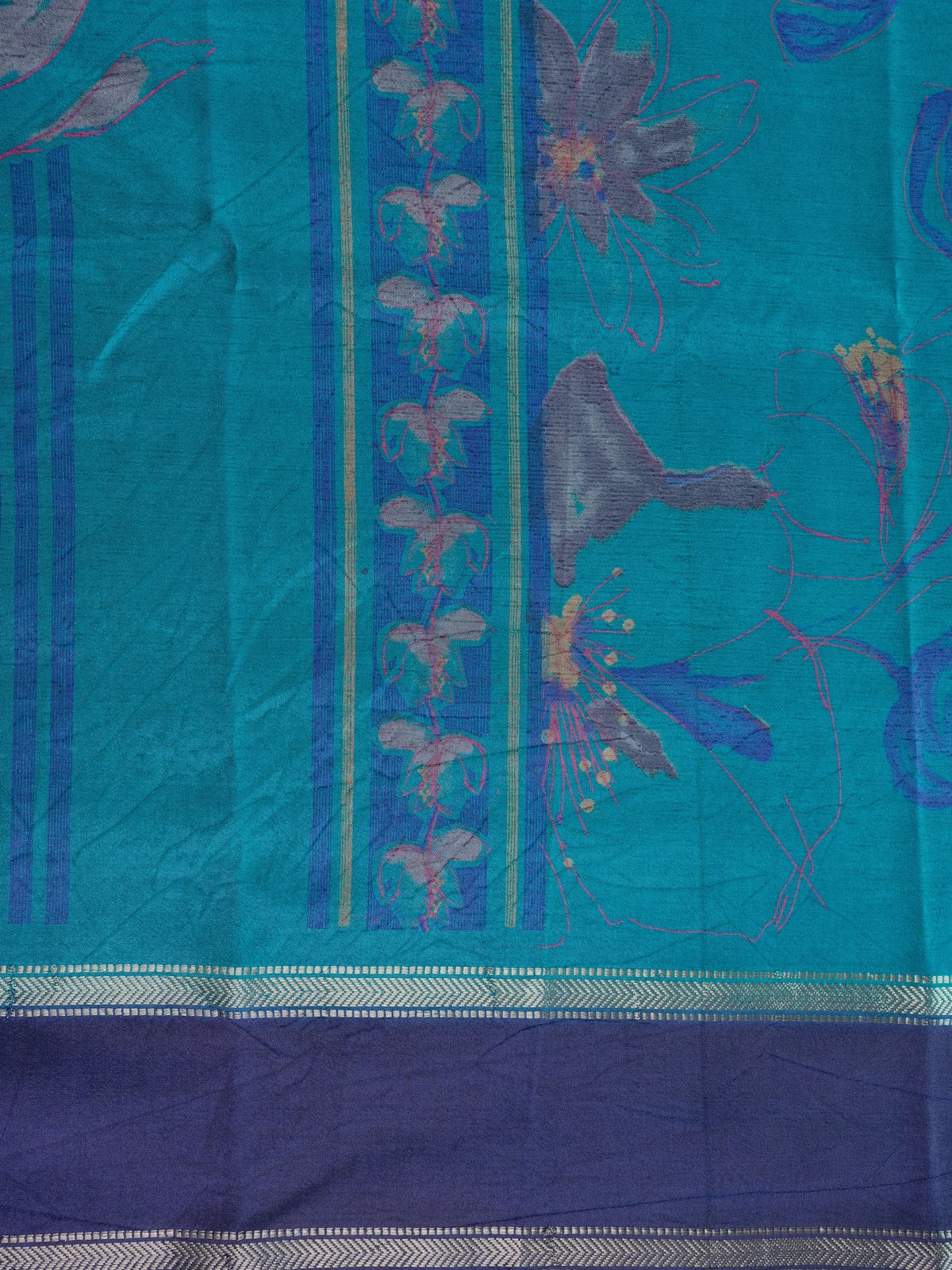 Teal blue Dola silk saree with floral prints, contrast navy zari border and yellow blouse