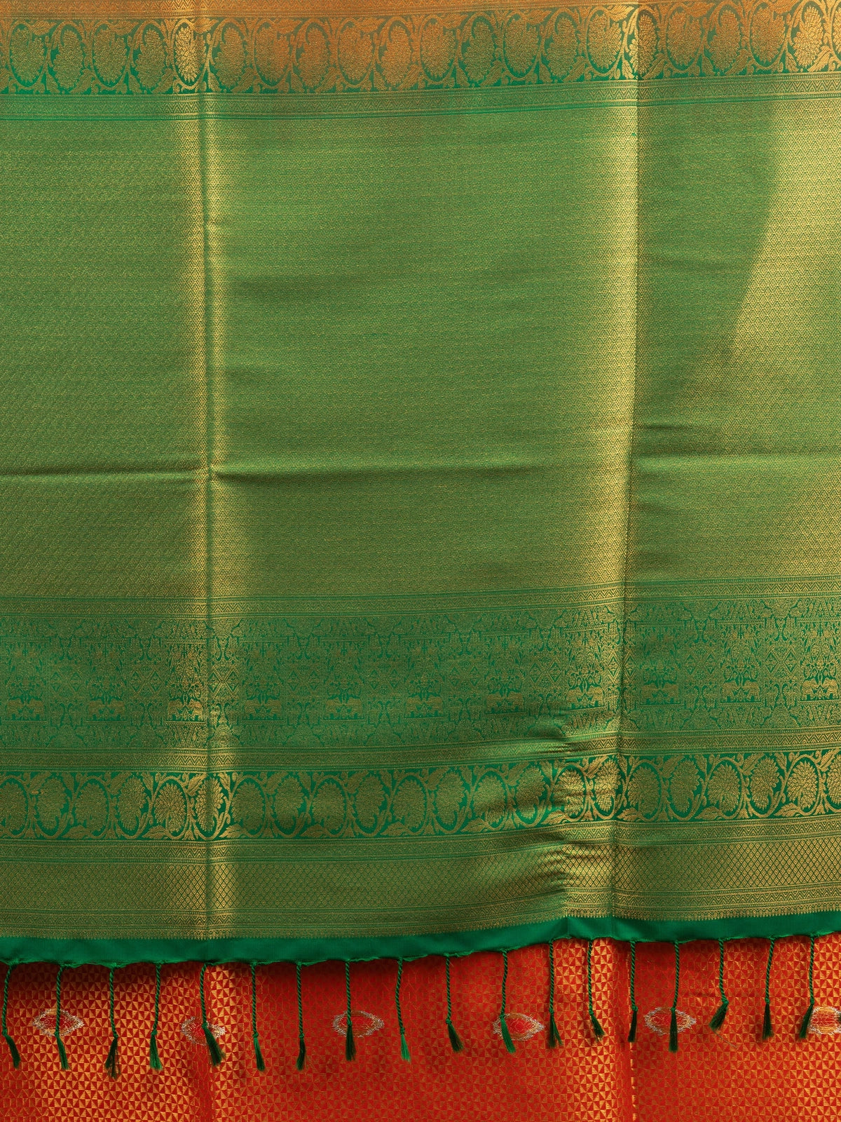 Orange Kanchipuram fancy silk saree with contrast green gold zari border and pallu