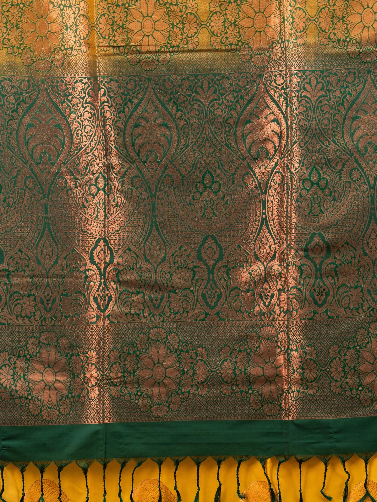 Yellow Kanchipuram fancy silk saree with green contrast border and copper zari pallu