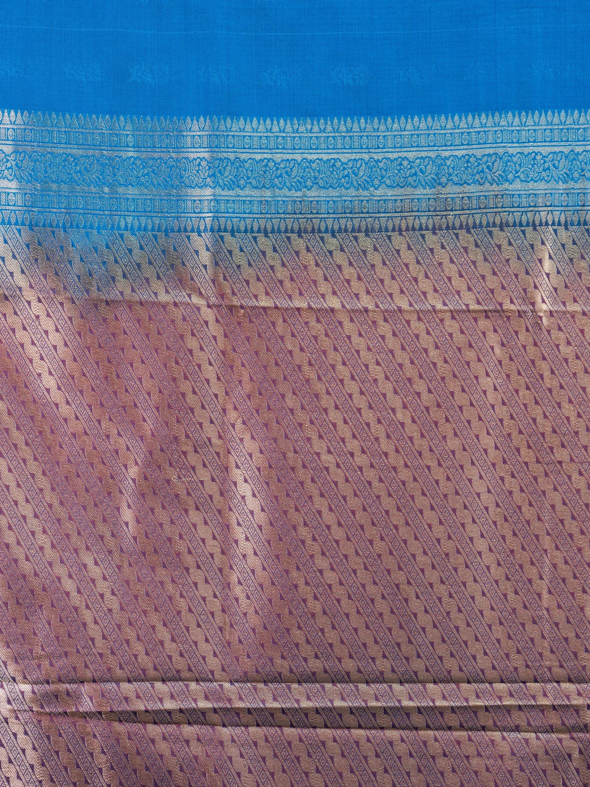 Peacock blue semi silk saree with contrast purple border and silver zari pallu