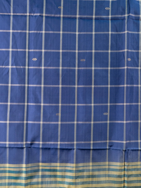 Royal blue and cream checked banana silk saree with woven butta motifs and a striped contrast pallu