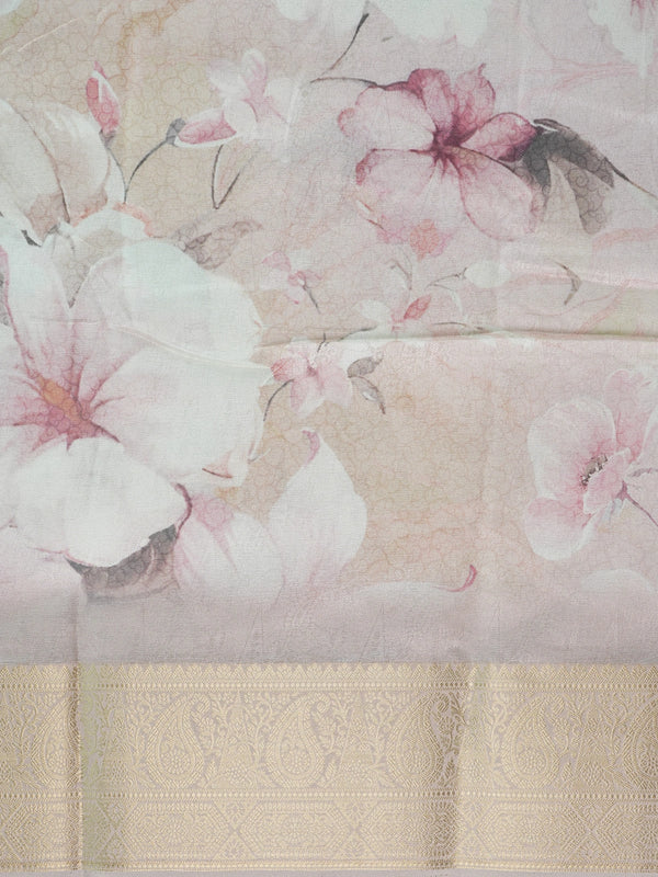 Pastel beige and pink floral designer art silk saree with gold zari border and printed pallu