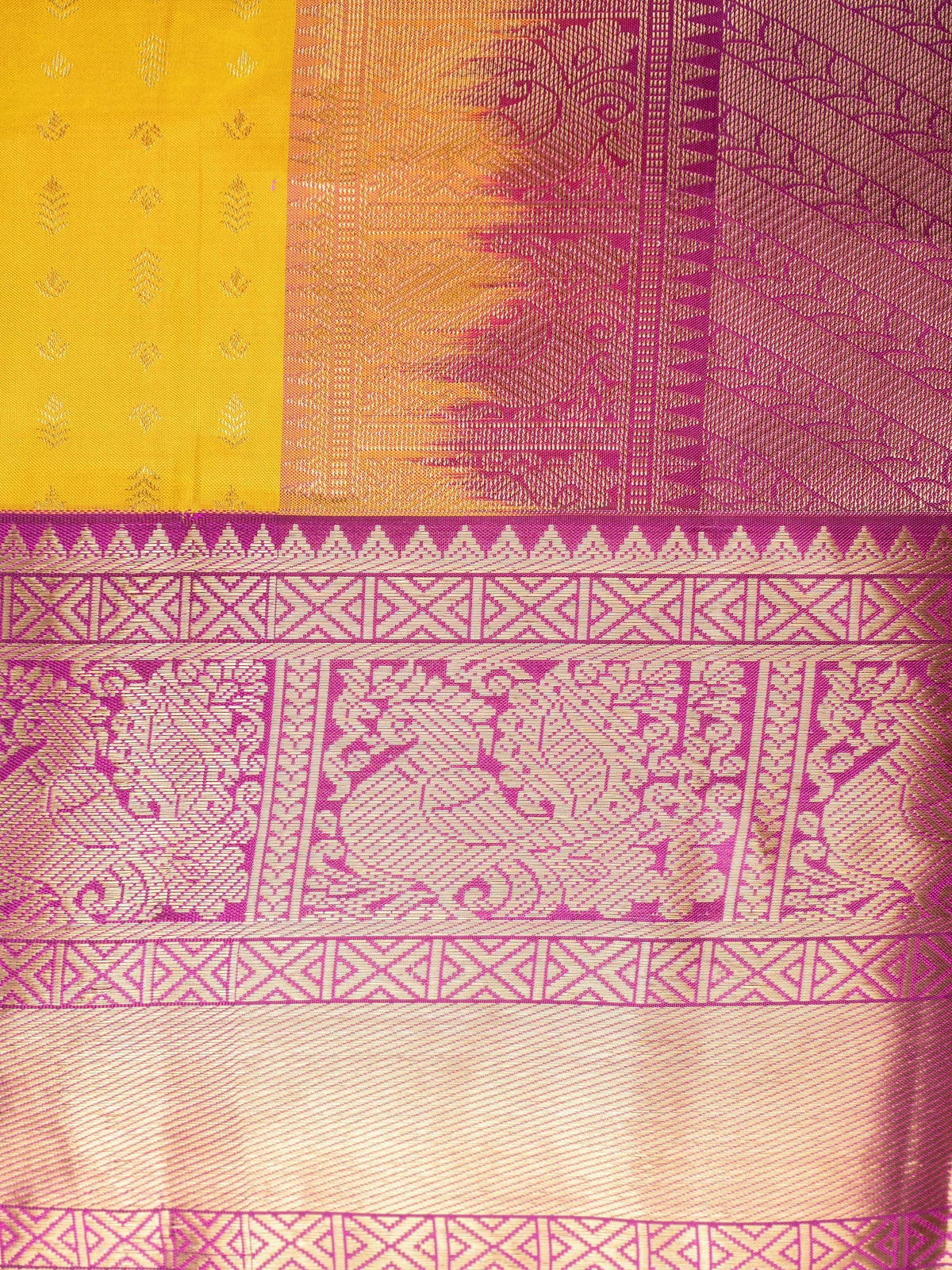 Mustard yellow pure Kanchipuram silk saree with magenta contrast gold zari border and pallu