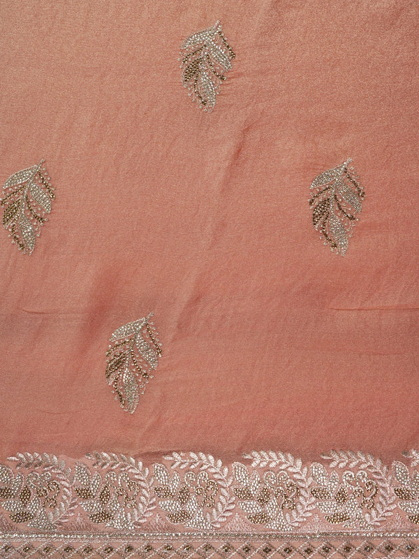 Peach shimmer tissue designer saree with embroidered leaf buttas and an ornate rose-gold border