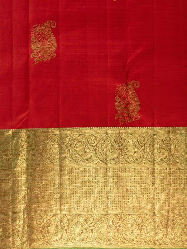 Red pure Kanchipuram silk saree with contrast green and gold zari border and paisley motifs
