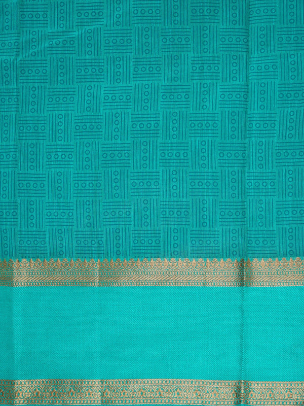 Teal green semi tussar saree with geometric body pattern and gold zari border