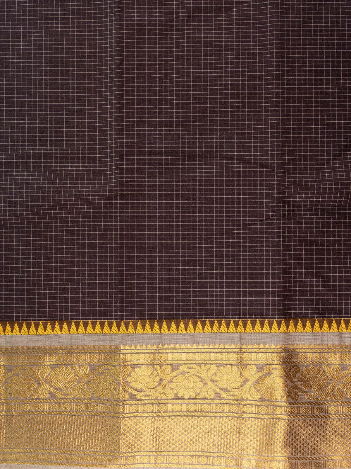 Dark brown Chettinad cotton saree with fine checks and contrast gold zari temple border