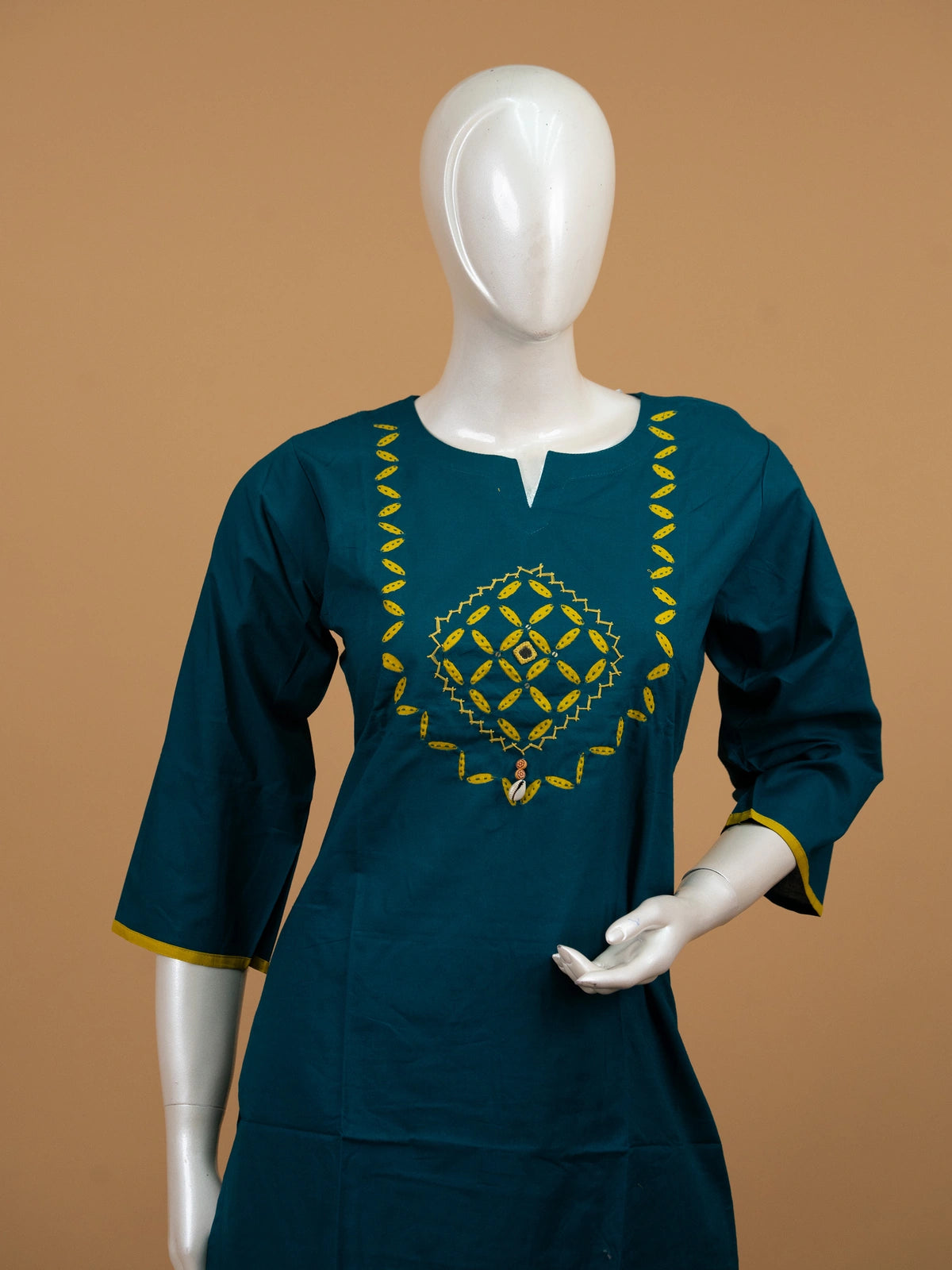 Teal cotton straight-cut kurti set with yellow mirror embroidery and contrasting mustard applique dupatta