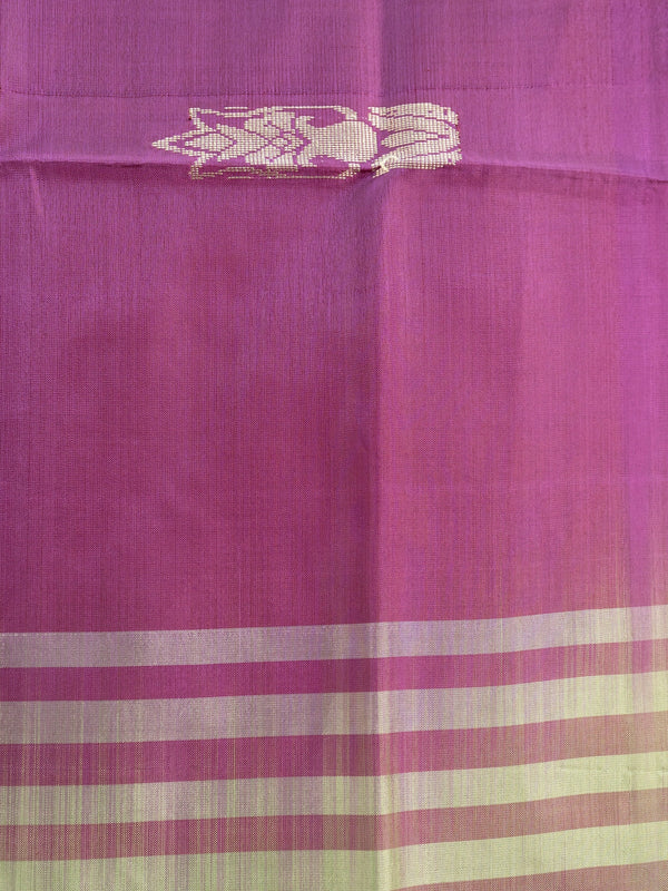 Purple banana silk saree with contrast green zari border and striped pallu