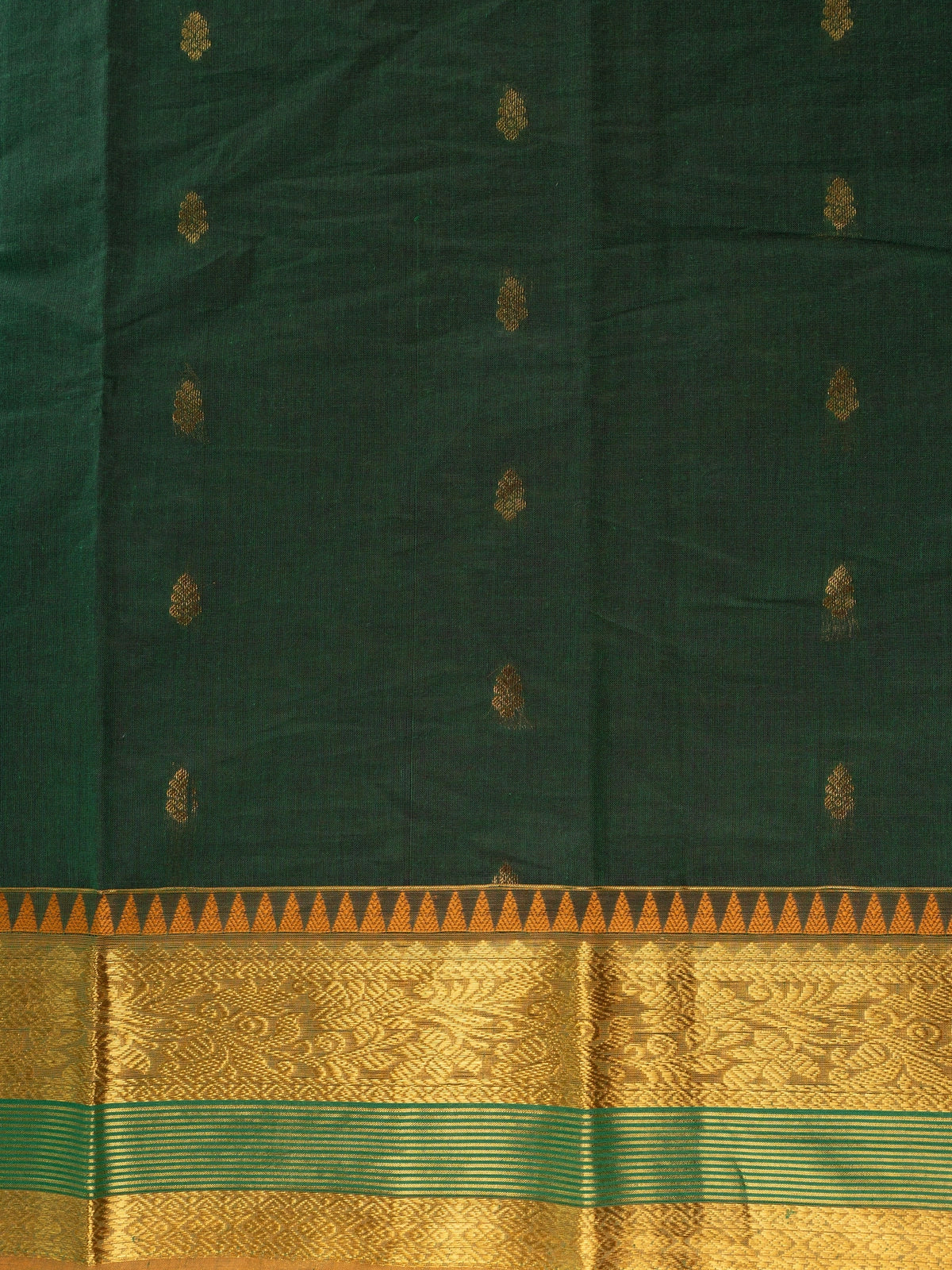 Dark green Chettinad cotton saree with gold zari temple border and woven zari pallu