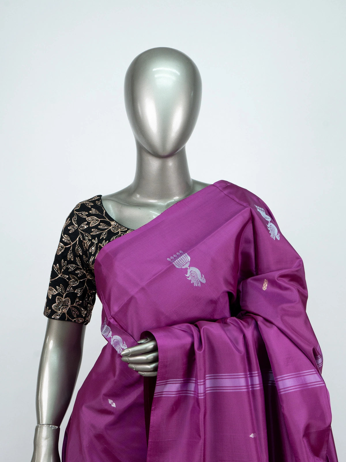 Magenta banana silk saree with peacock zari buttas and striped pallu