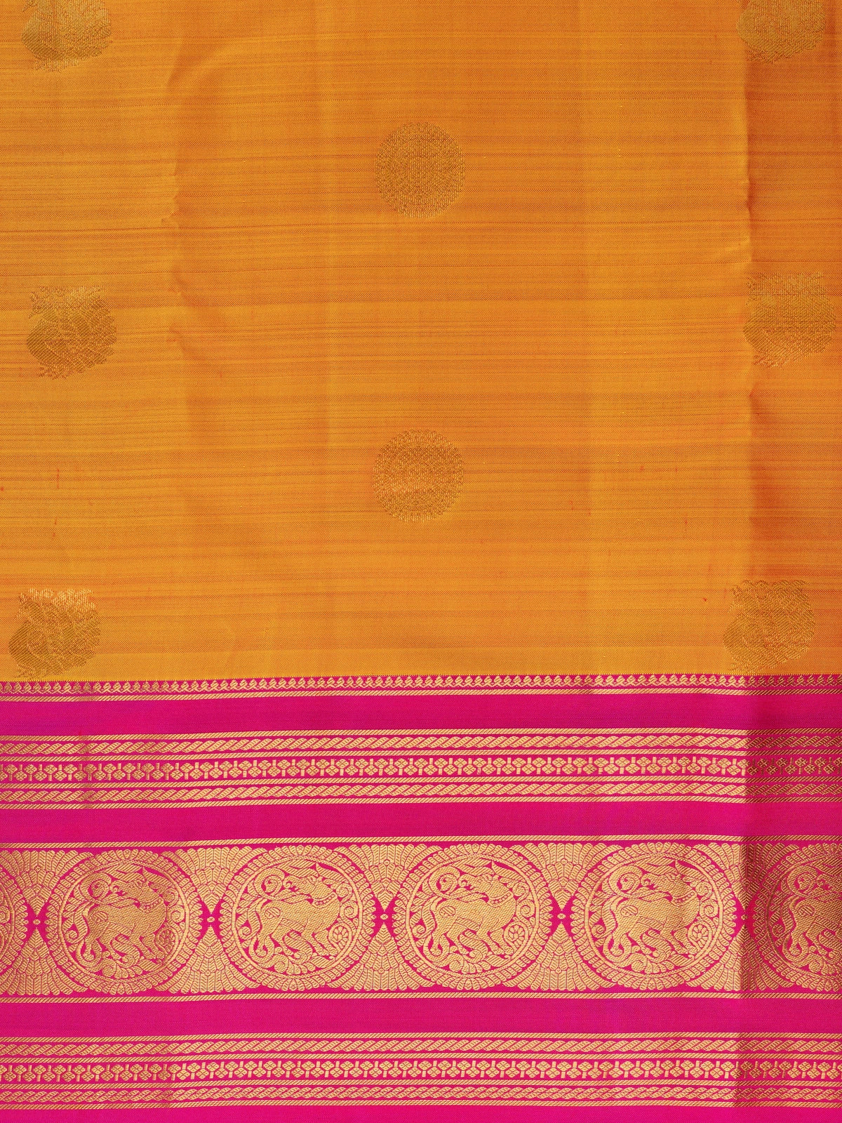 Orange and pink pure Kanchipuram silk saree with contrast gold zari border and buttas