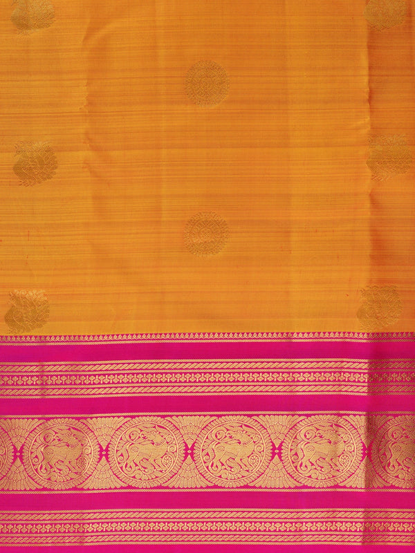Orange and pink pure Kanchipuram silk saree with contrast gold zari border and buttas