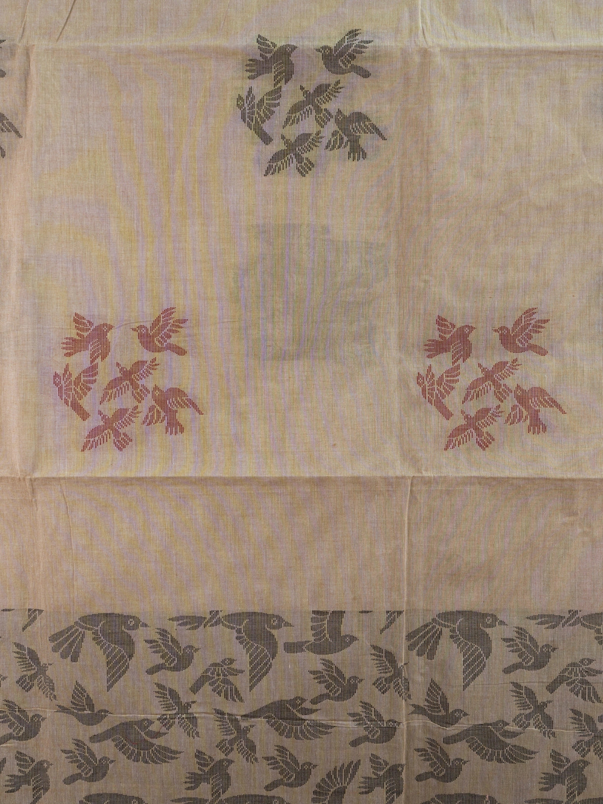 Beige silk cotton saree with grey and maroon flying-bird motifs and a bird-patterned pallu