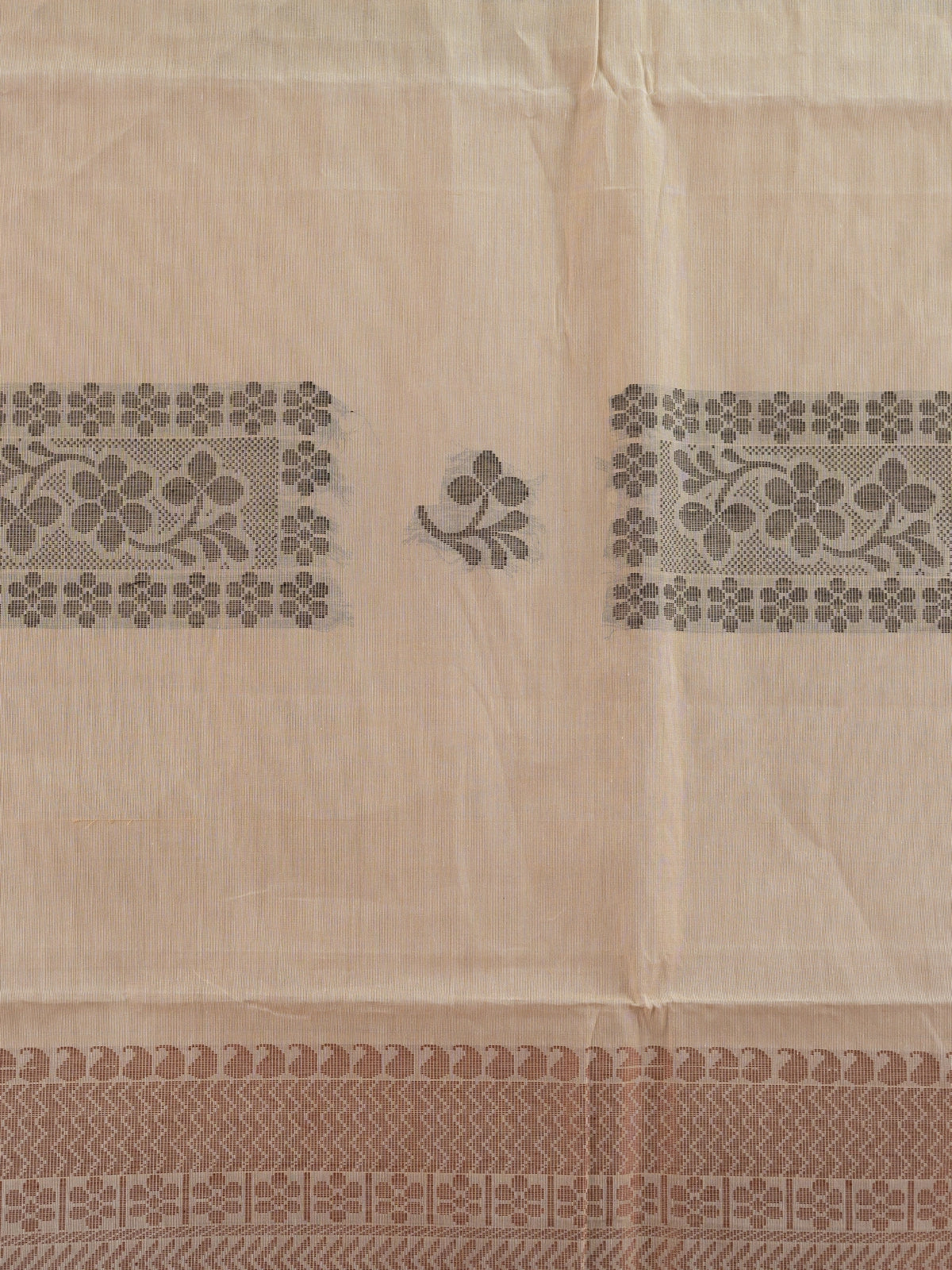 Beige silk cotton saree with grey contrast border and woven floral motifs