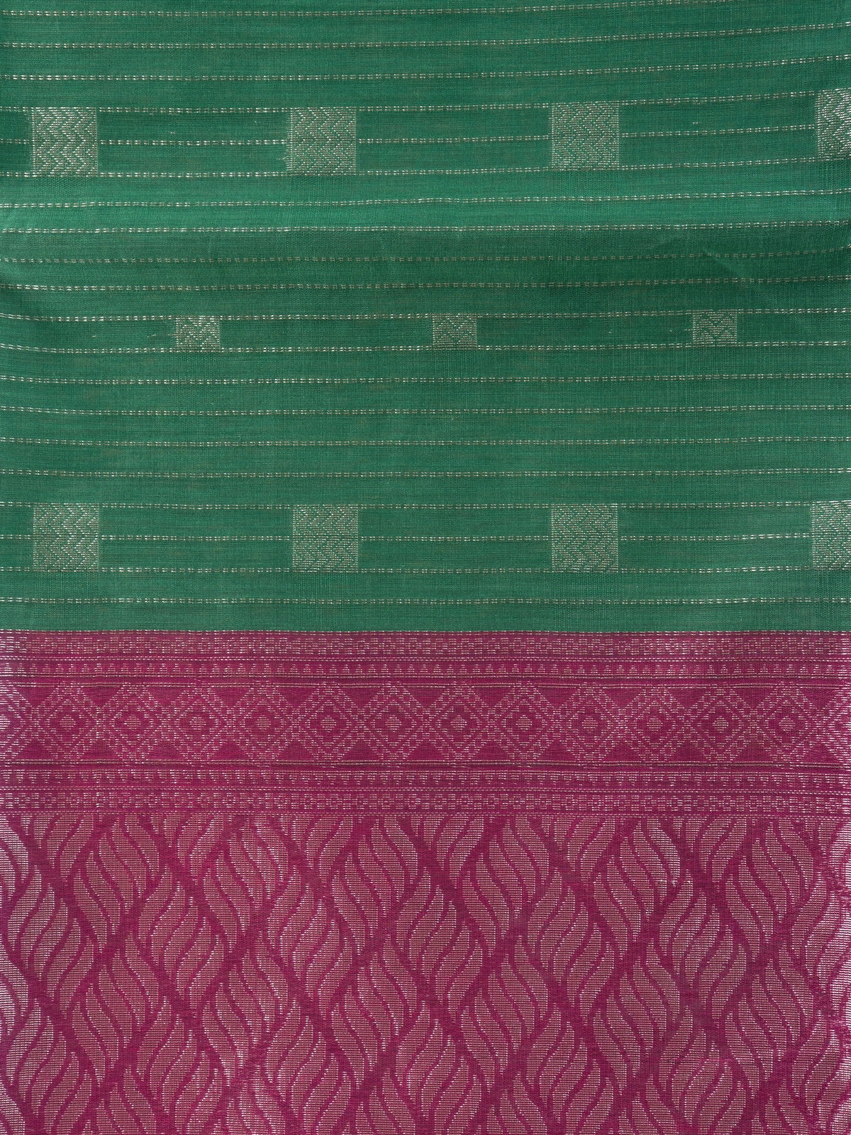 Bottle green silk cotton saree with silver zari stripes and contrast magenta border and pallu