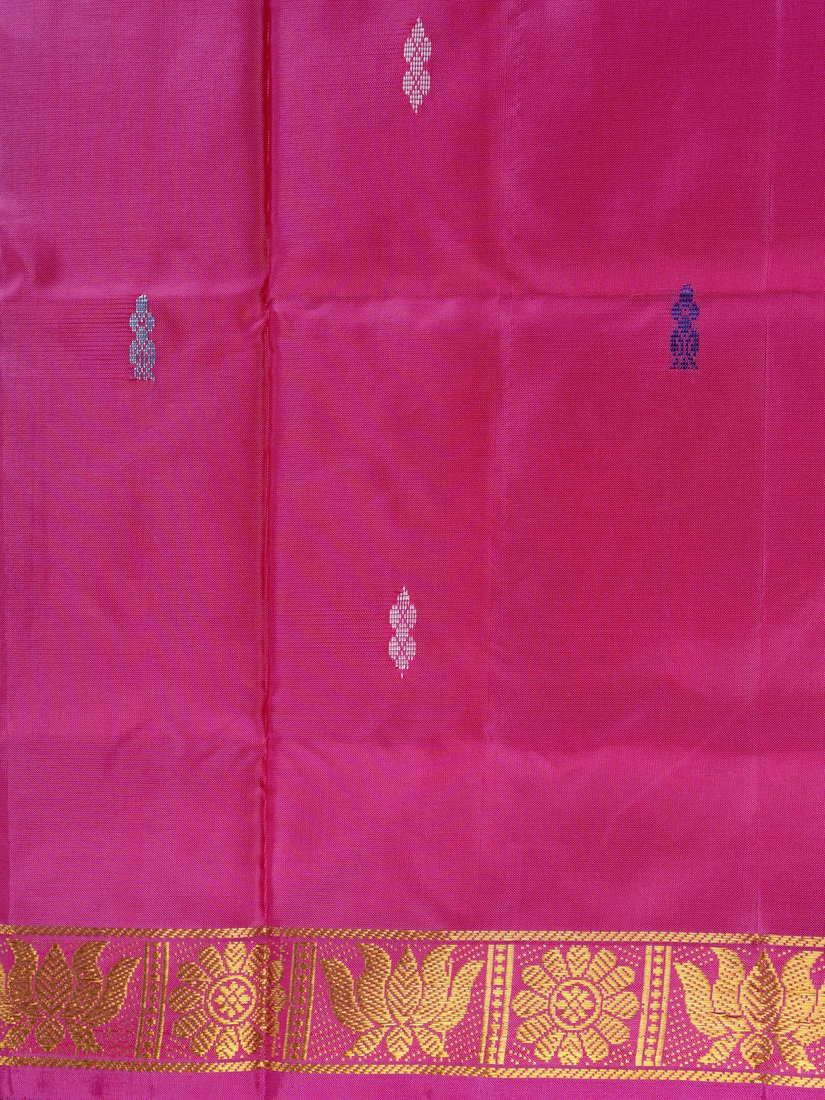 Pink banana silk saree with gold zari border, blue buti motifs and contrasting sky blue pallu