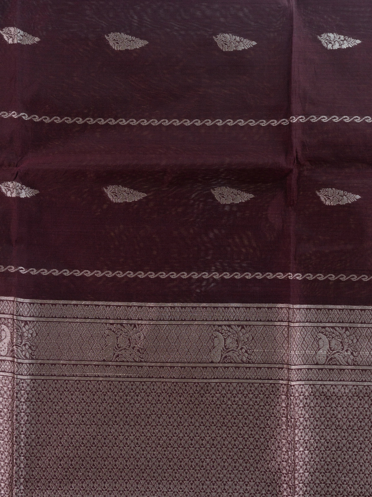 Wine silk cotton saree with silver zari buttas and contrast peacock-motif border