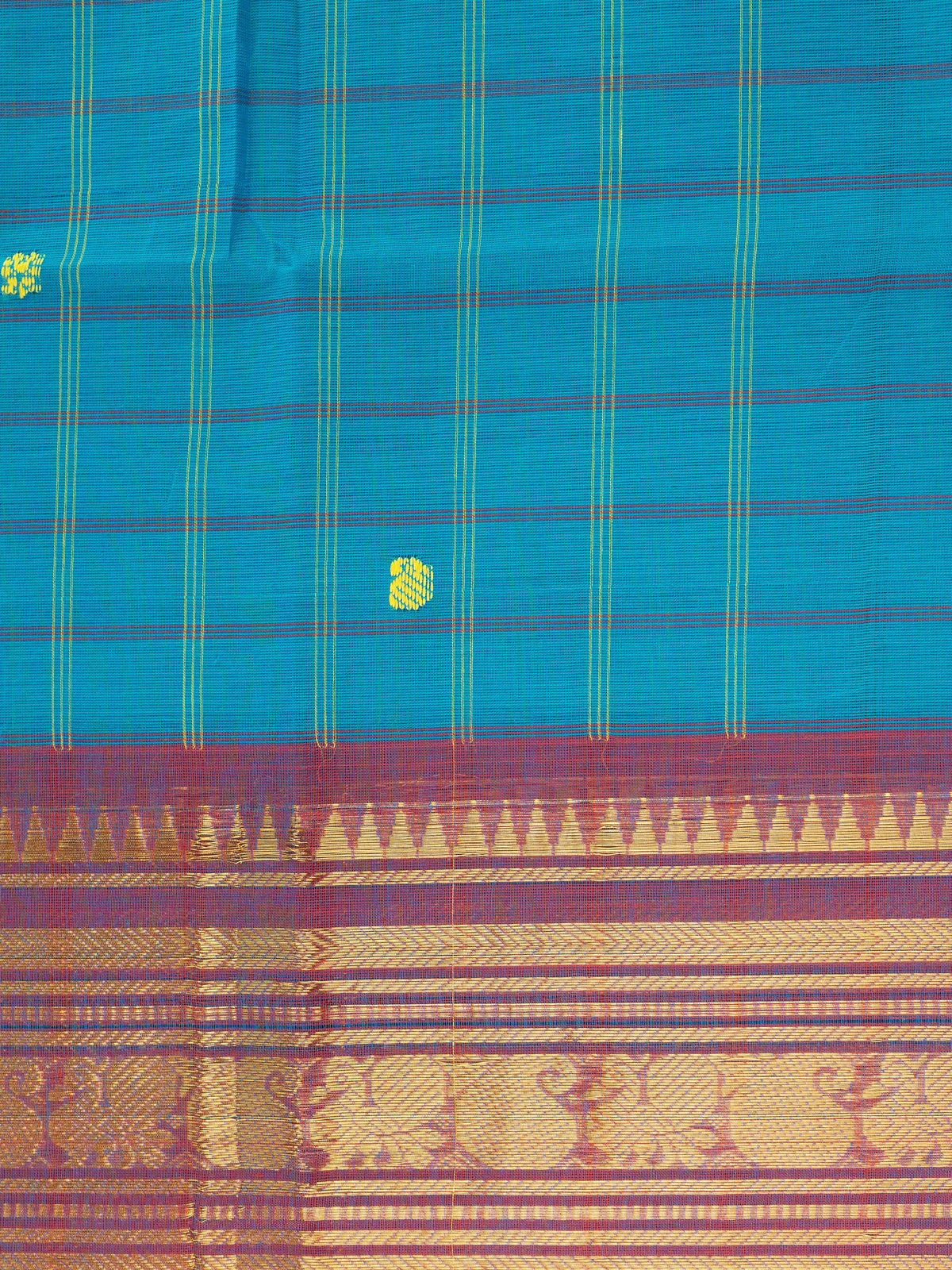 Peacock blue Chettinad cotton saree with checked body, yellow buttas and magenta gold zari border
