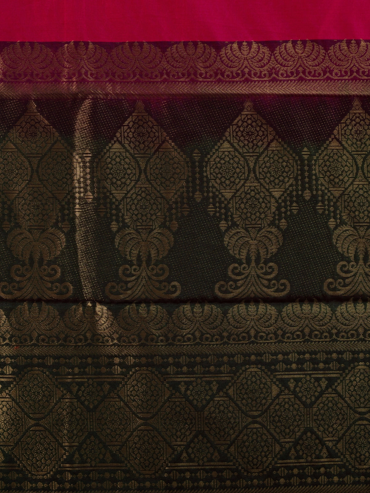 Rani pink silk cotton saree with contrast green and gold zari border and pallu