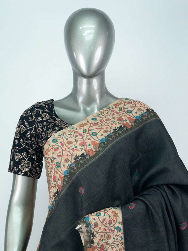 Black linen cotton saree with contrast cream multicolour floral border and pallu