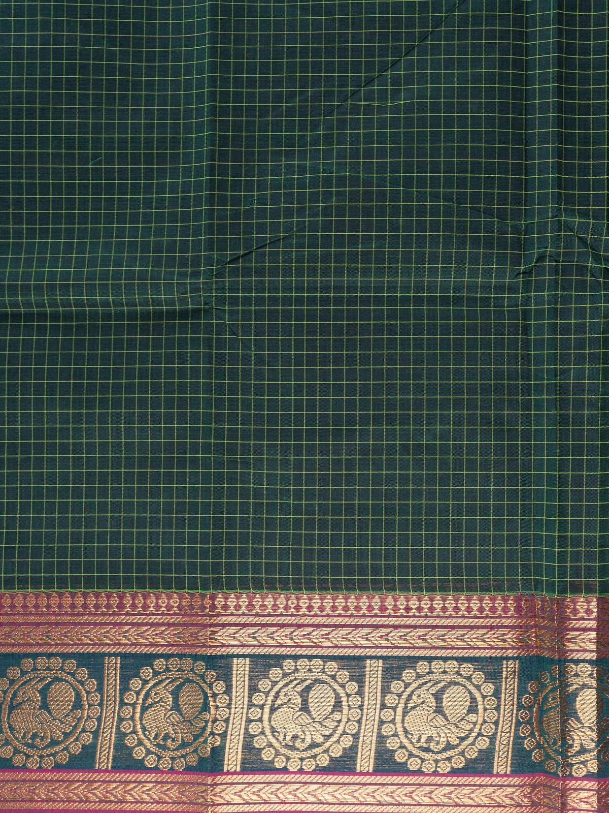 Green Chettinad cotton saree with yellow checks and a magenta gold zari peacock border