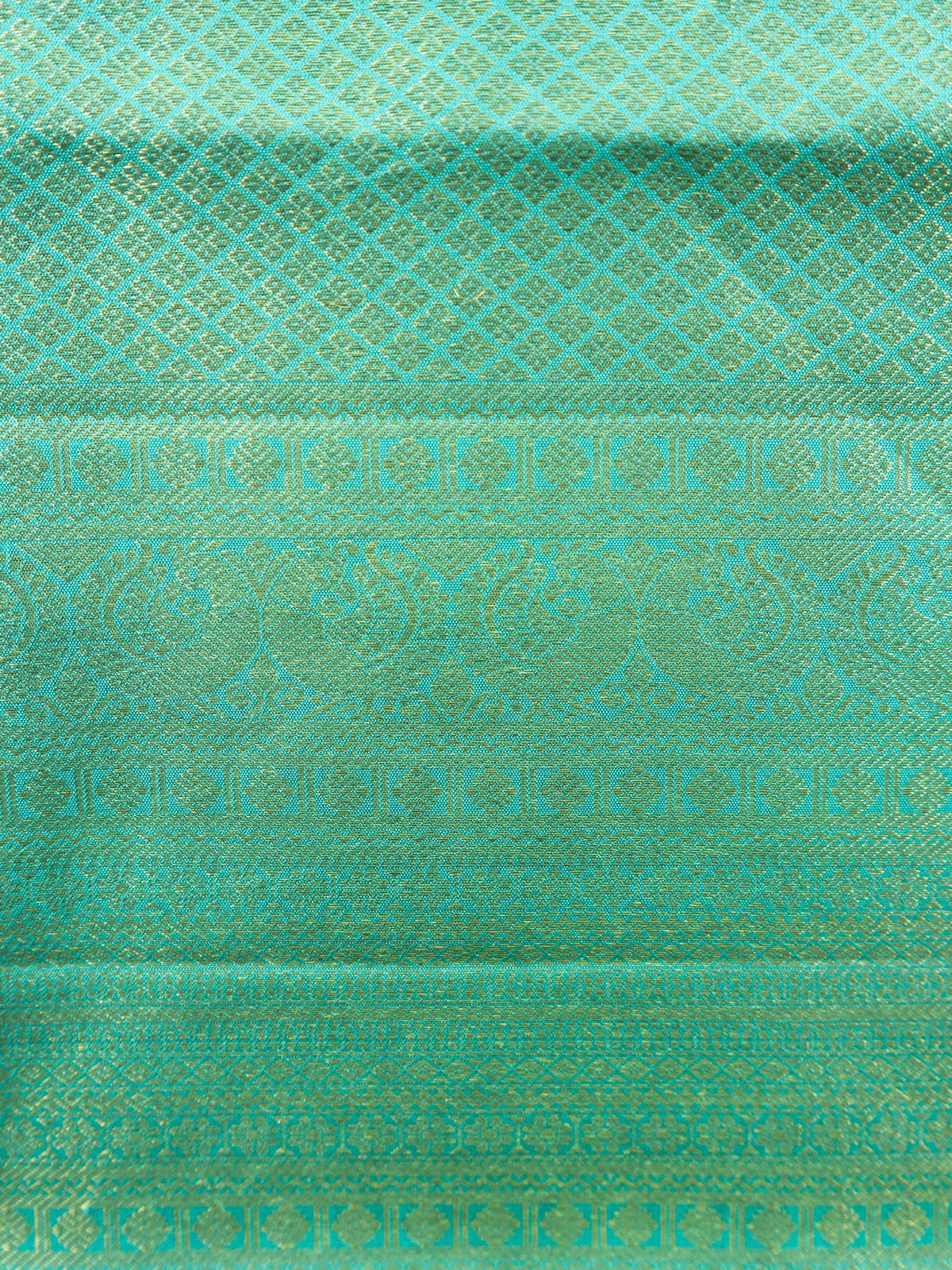 Maroon pure Kanchipuram silk saree with teal green contrast gold zari border and paisley motifs