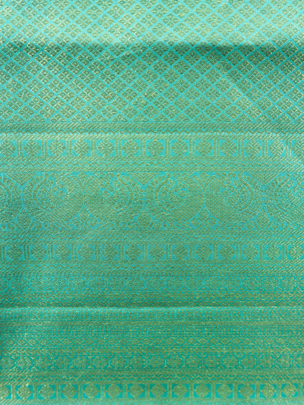 Maroon pure Kanchipuram silk saree with teal green contrast gold zari border and paisley motifs