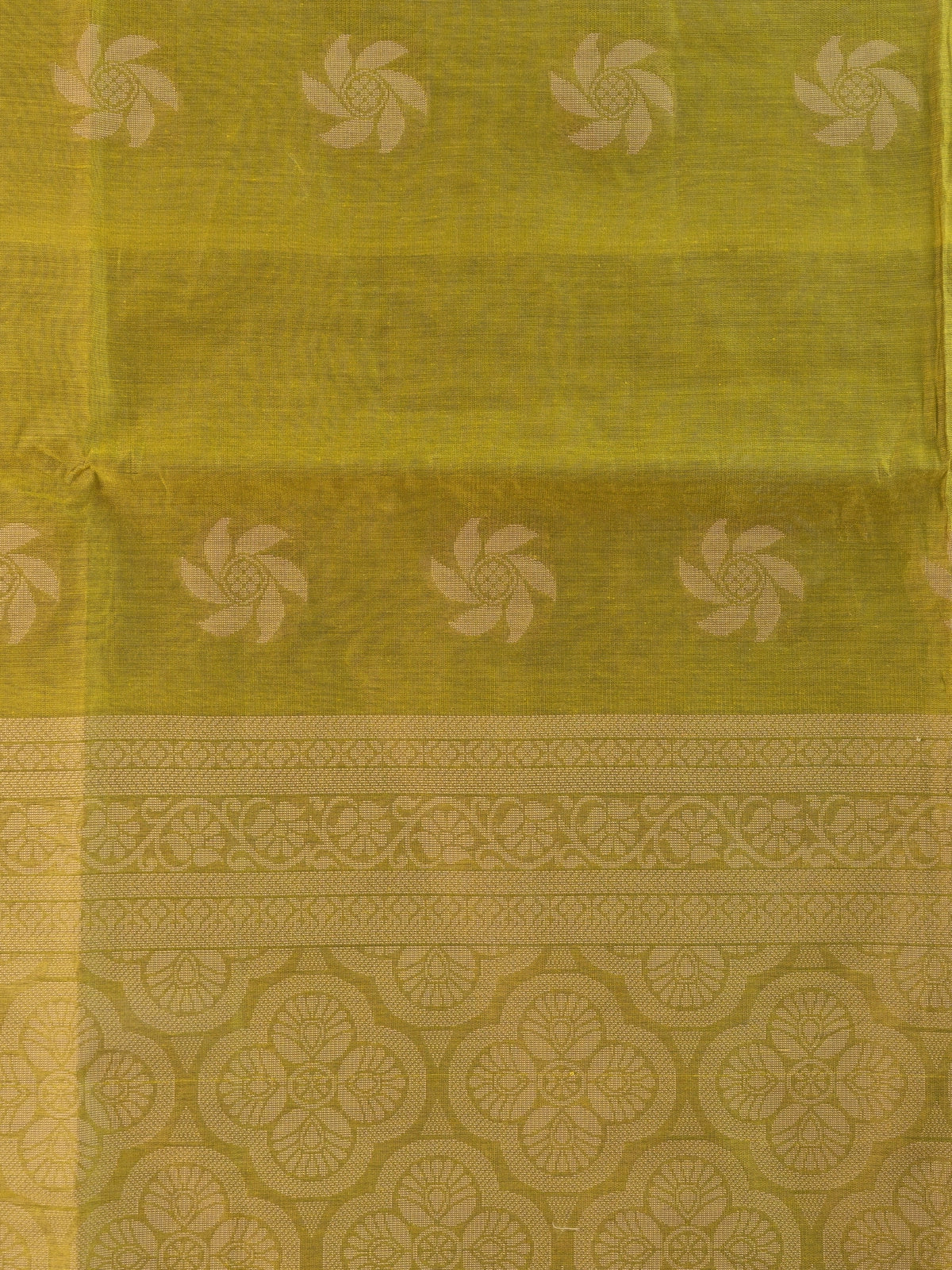 Olive green silk cotton saree with cream woven floral buttas and decorative border