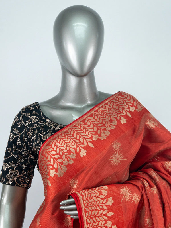 Red semi raw silk saree with gold zari butas, leaf-vine border and multicoloured floral pallu
