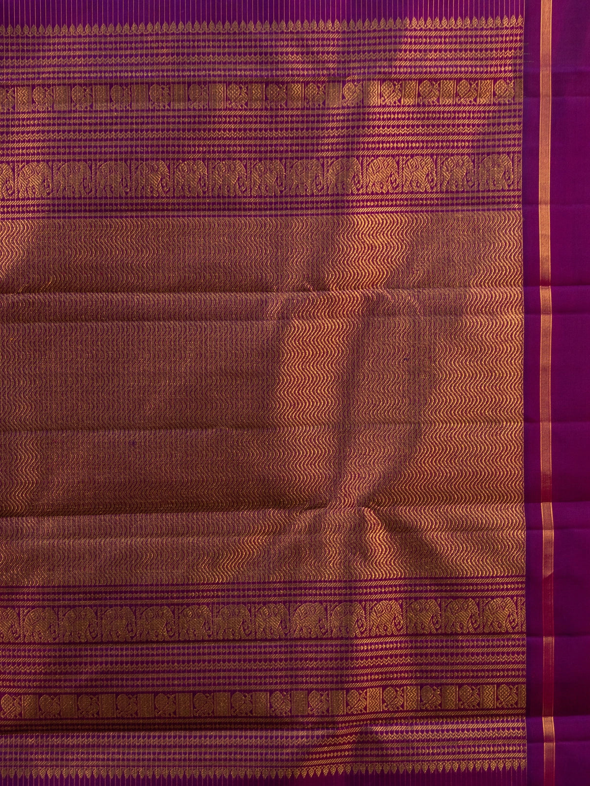 Orange and purple pure Kanchipuram silk saree with gold zari border and traditional motif pallu