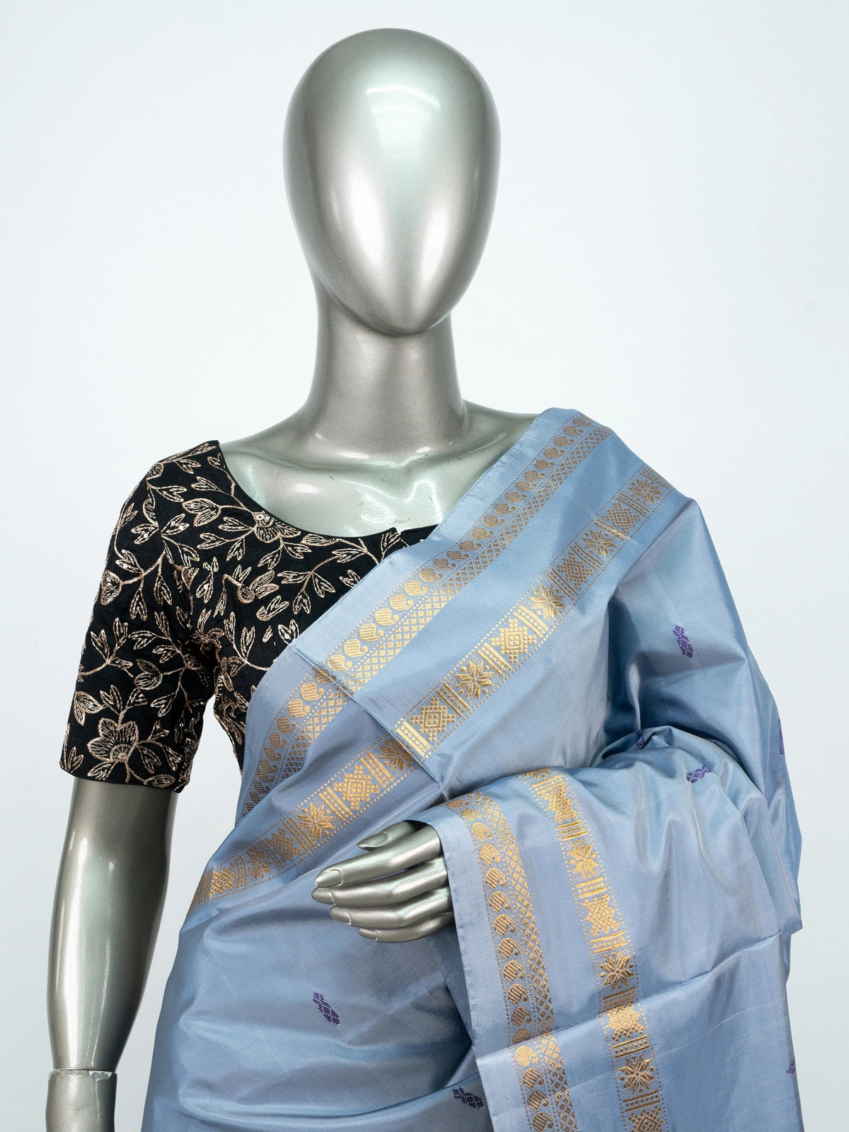 Dusty blue-grey Banana Silk saree with teal green contrast pallu and gold zari border