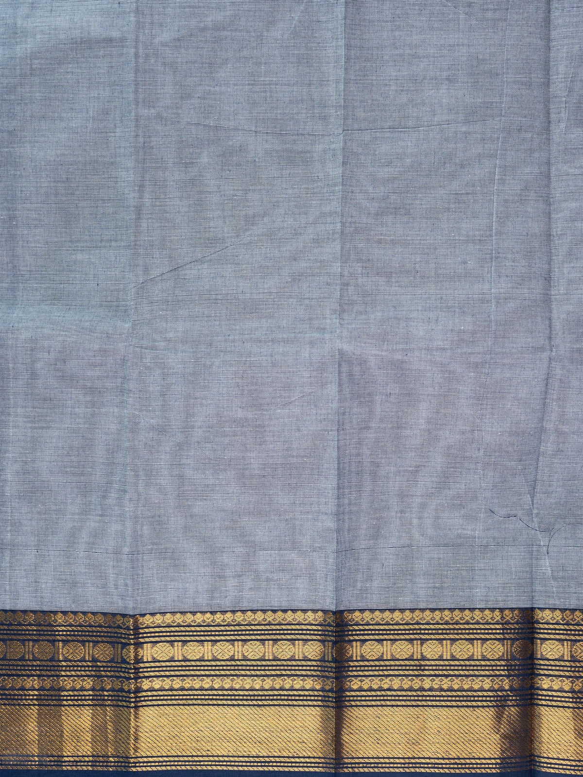 Grey Chettinad cotton saree with contrast navy blue and gold zari border