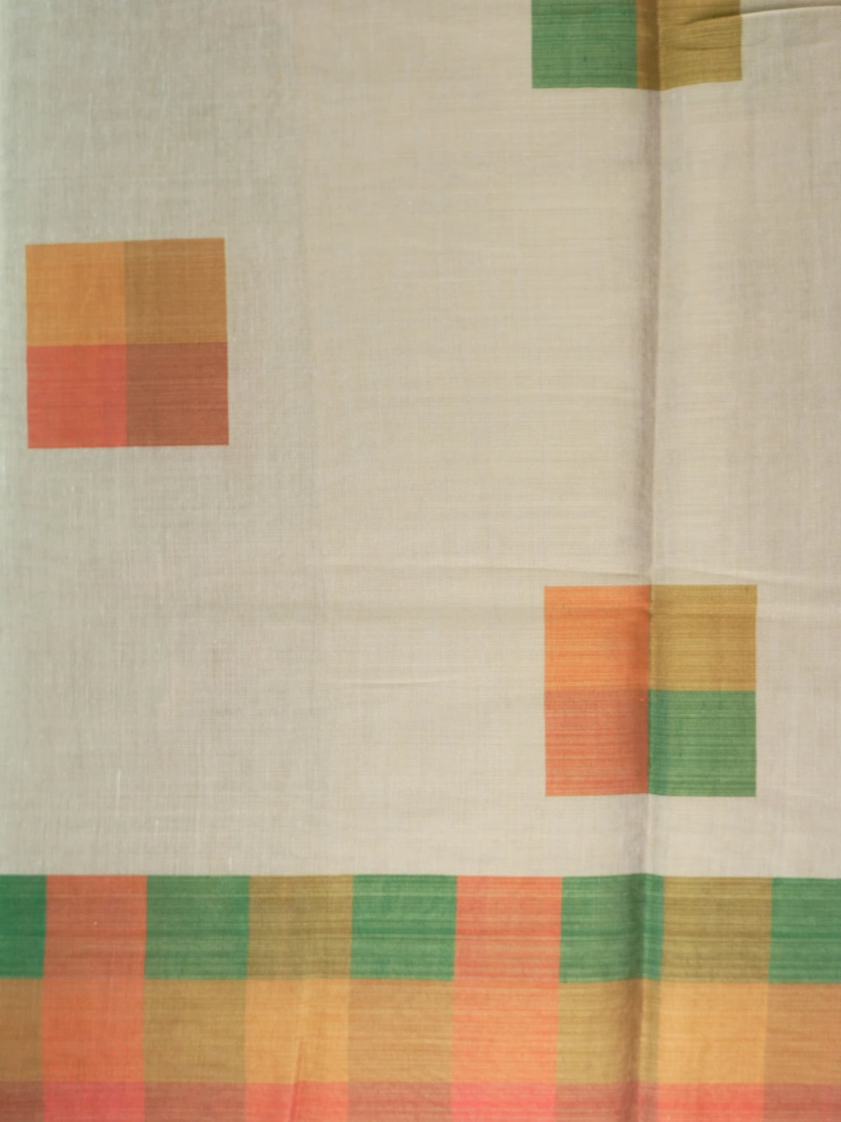 Cream linen cotton saree with multicoloured checked border, scattered square motifs and checked pallu