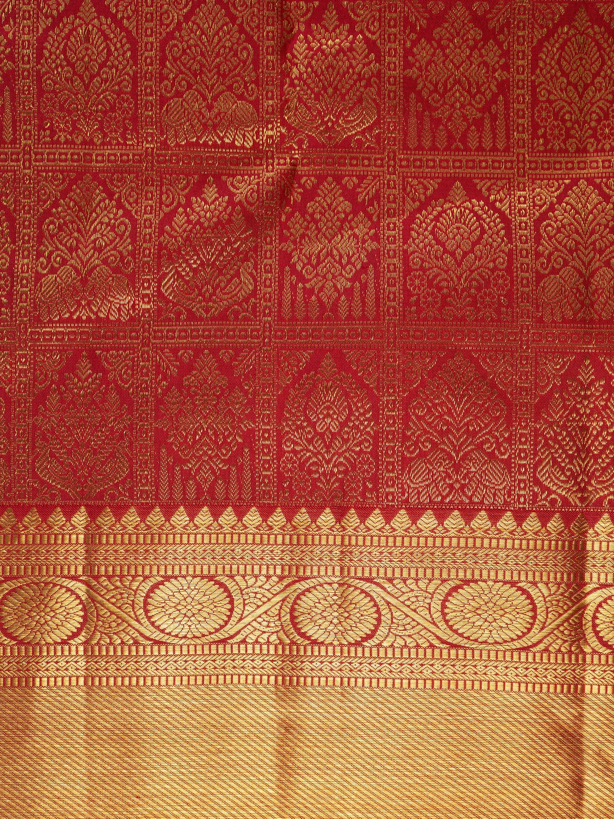 Red pure Kanchipuram silk saree with all-over gold zari brocade and wide contrast gold border